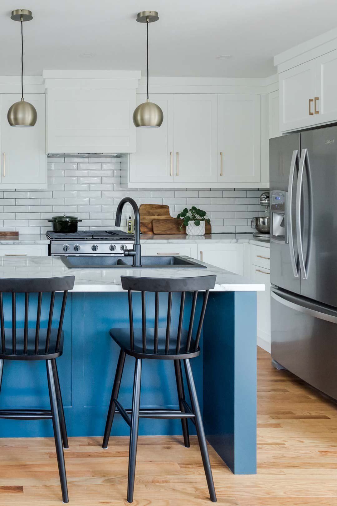 kitchen-with-blue-island-and-white-cabinets.jpg