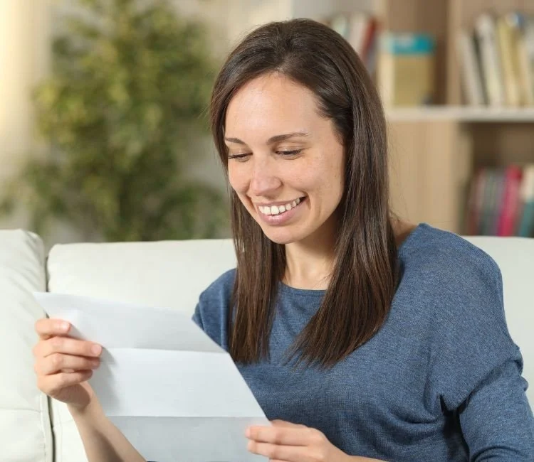 Female founder reading a letter from SK