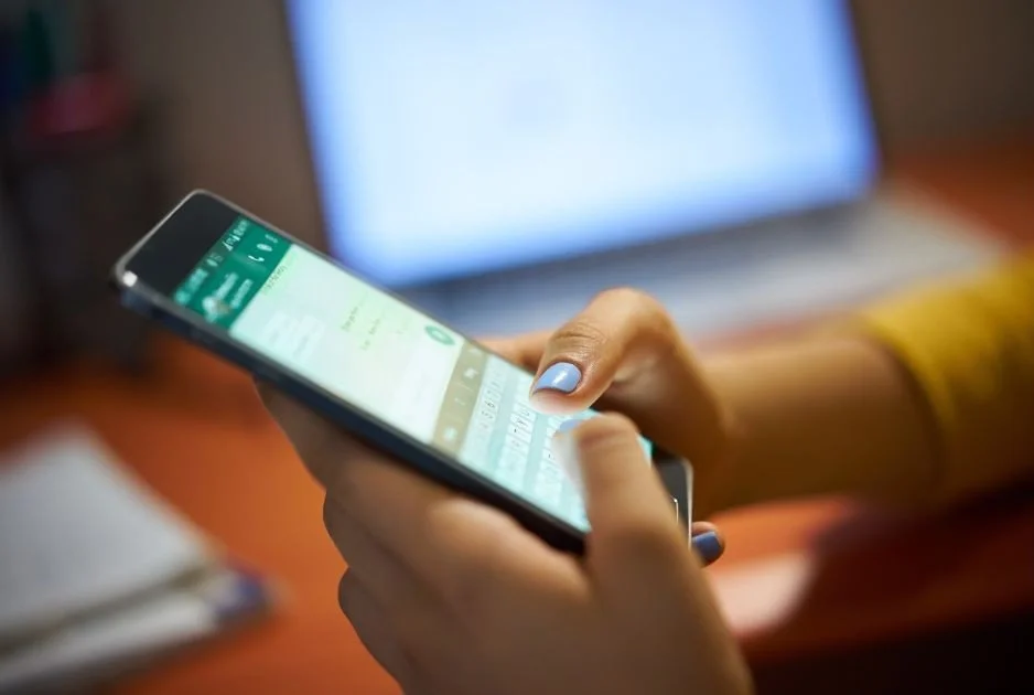 woman sending whatapp message
