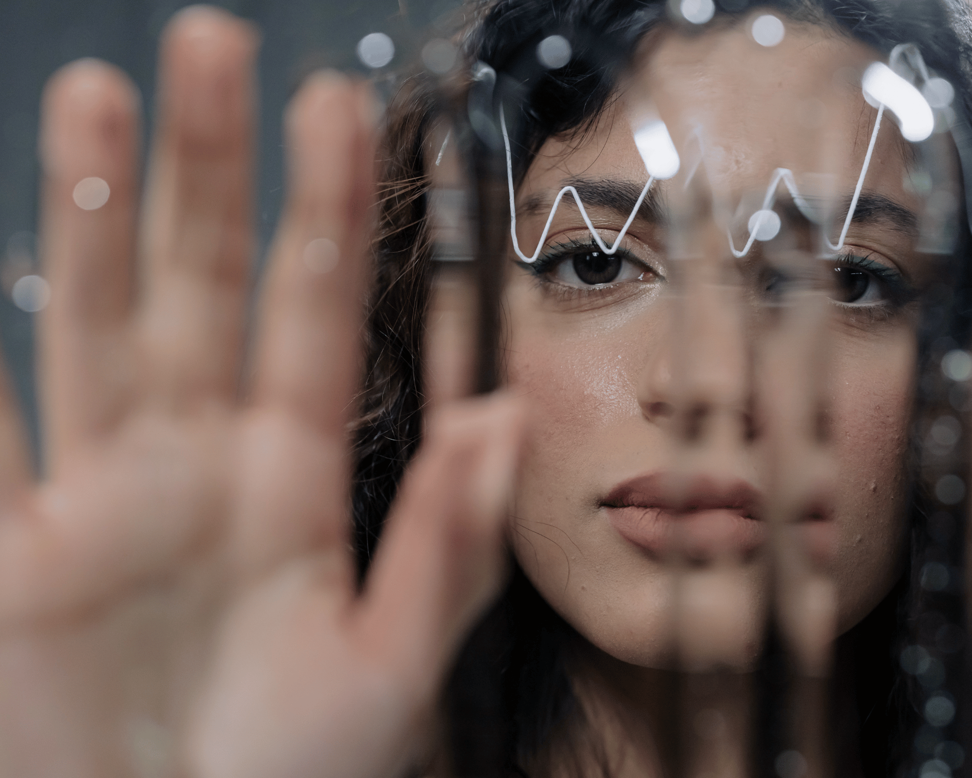 Image of confused and bewildered adult woman to show impact of growing up with gaslighting & healing with online therapy in Colchester, Connecticut & Virginia