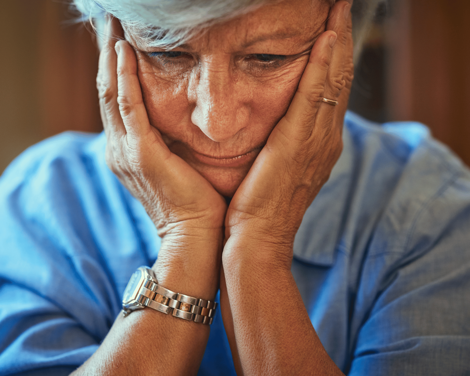 Image of woman holding face and filled with dread to illustrate online therapy for adults daughters of narcissistic mothers in Colchester, CT 06415 and Virginia