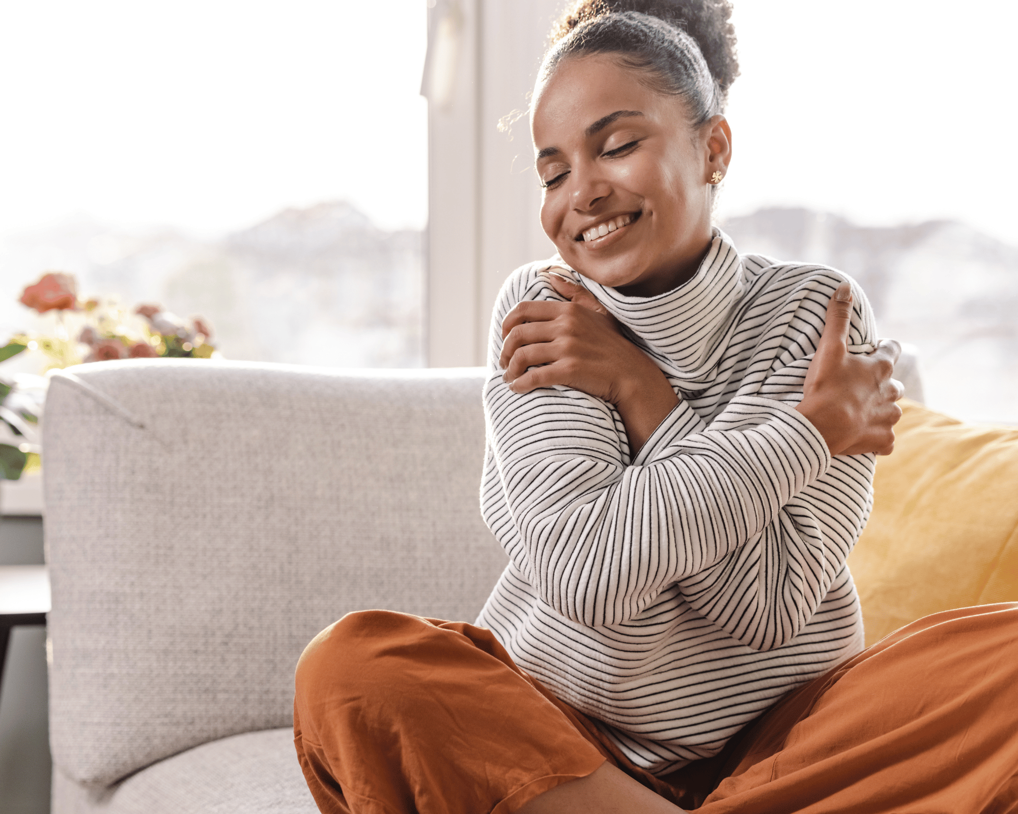 Image of woman experiencing self-love and healing to show online therapy for mother wounds in Connecticut offered by mother wound therapist in Connecticut