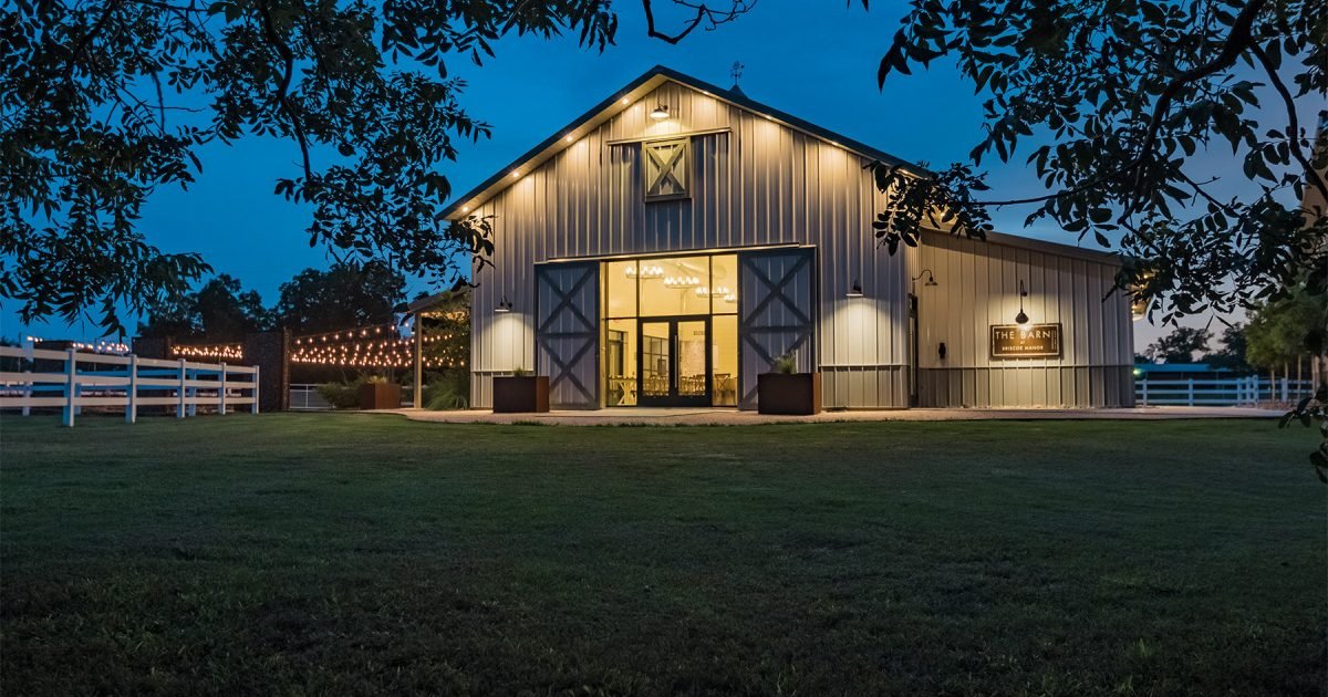Modern pole barn at dawn