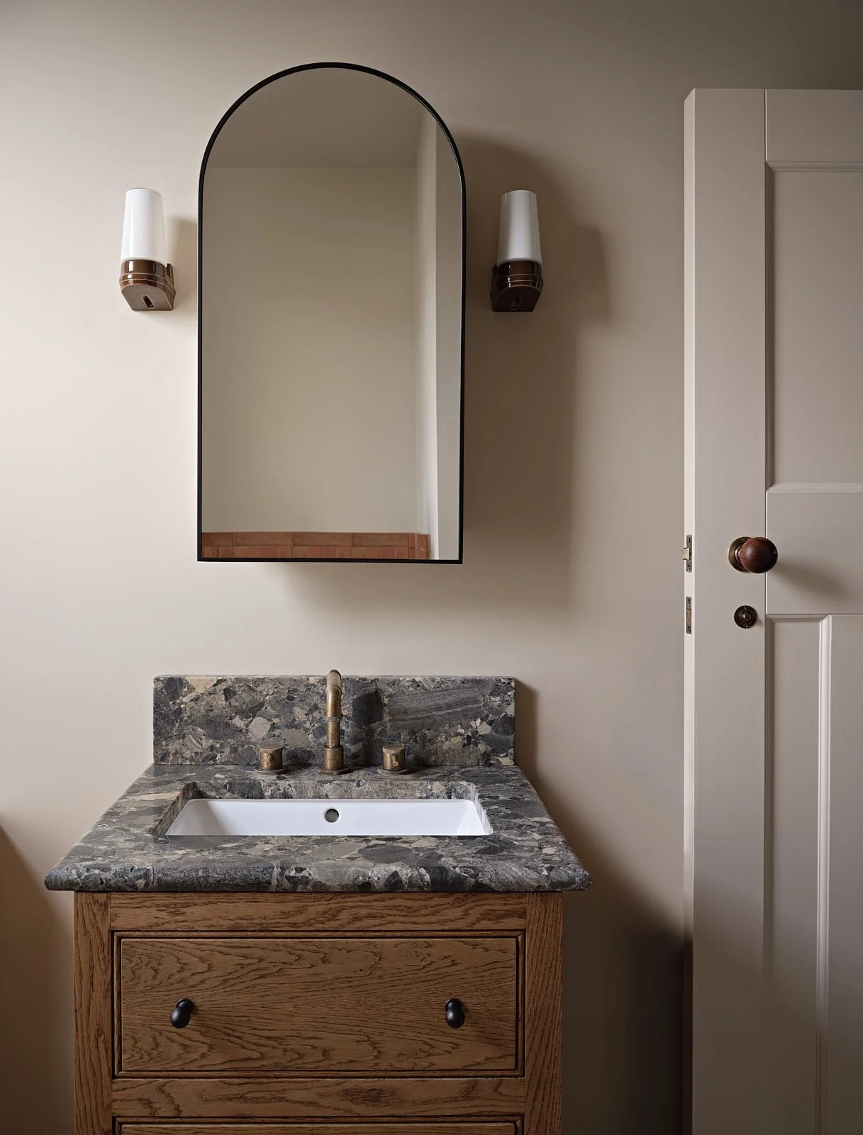 Marble and oak vanity in a London family bathroom, designed by Studio Eight Design.