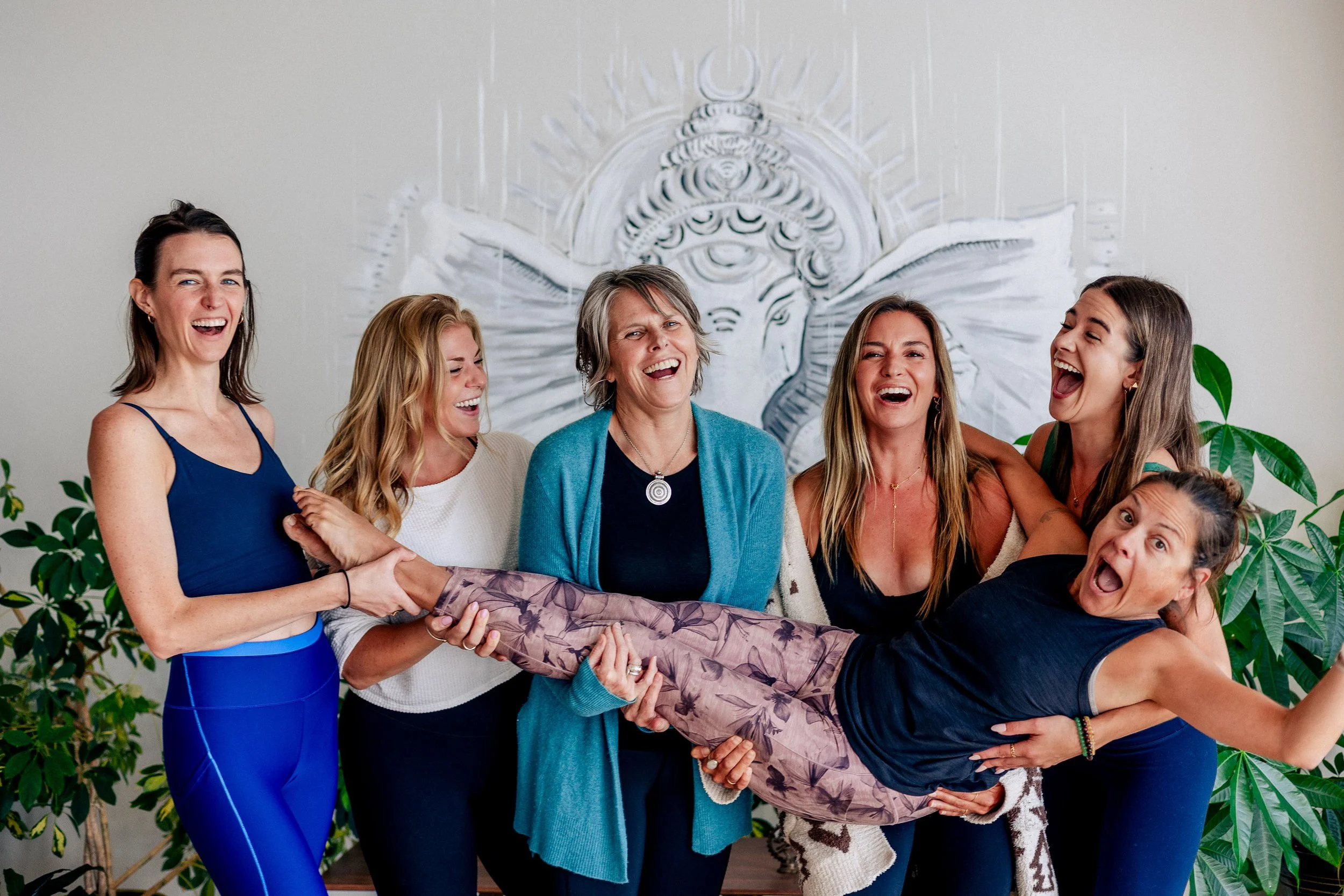 Staff Laughing, holding Katie B.jpg