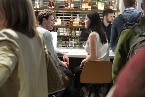 Guests at a bar during a CNCT happy hour