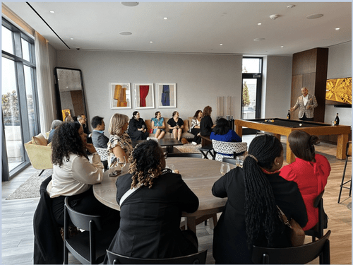 CNCT roundtable discussion in a modern lounge space