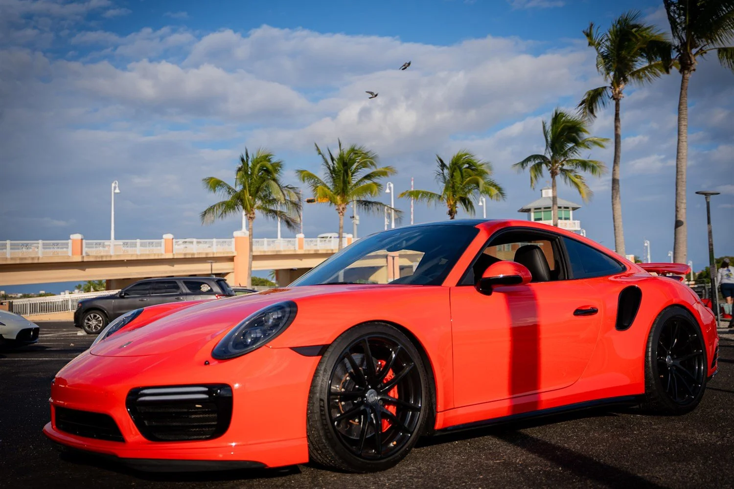 13 - porsche-911-turbo-s-side-three-quarter-lifestyle.jpg