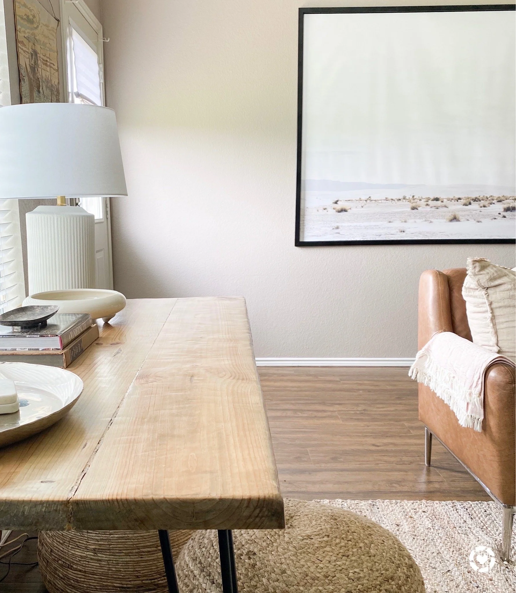 neutral living room with large art.JPG