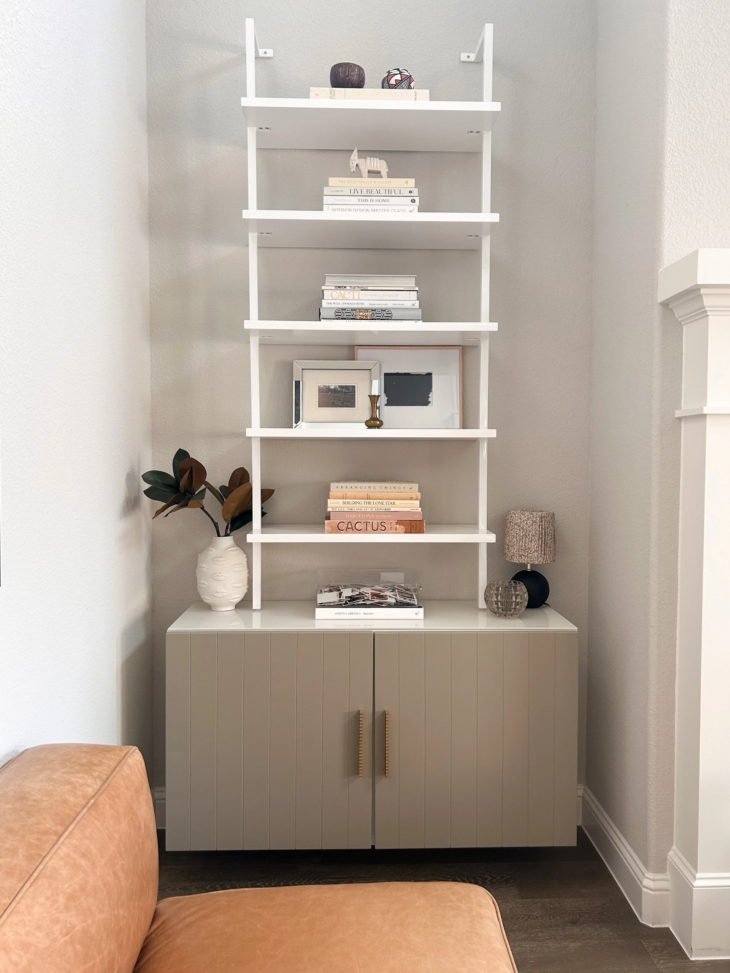 neutral living room shelf styling.JPEG