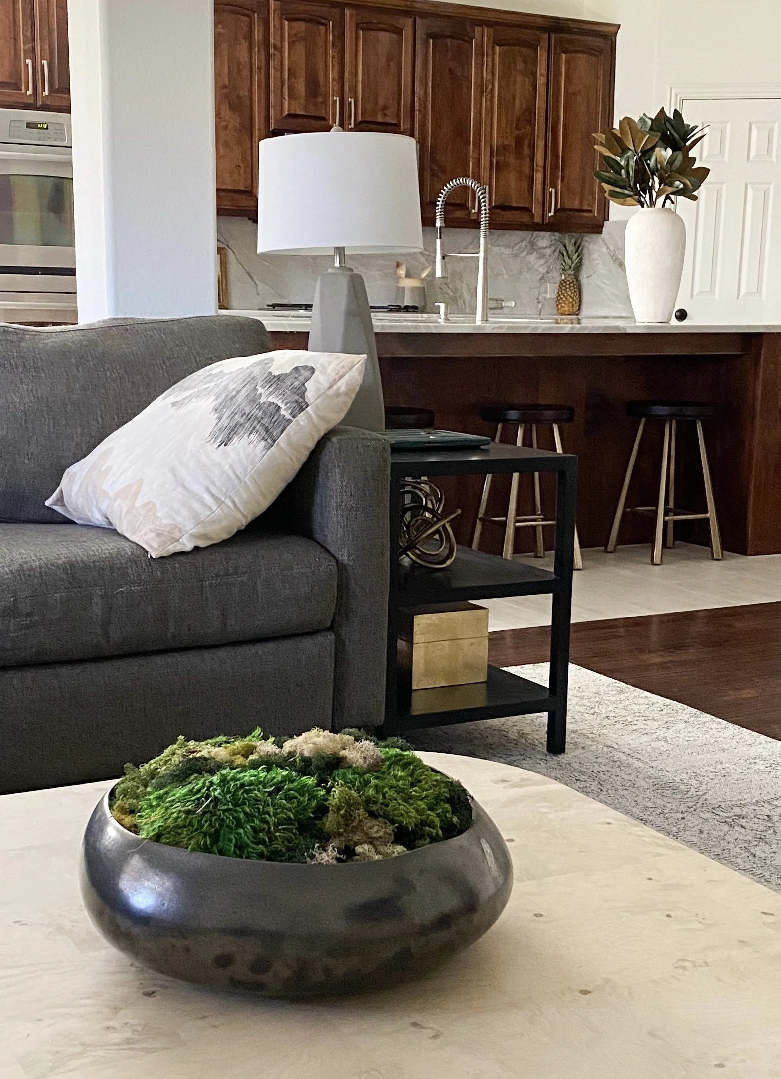 living room styling with gray couch.jpg