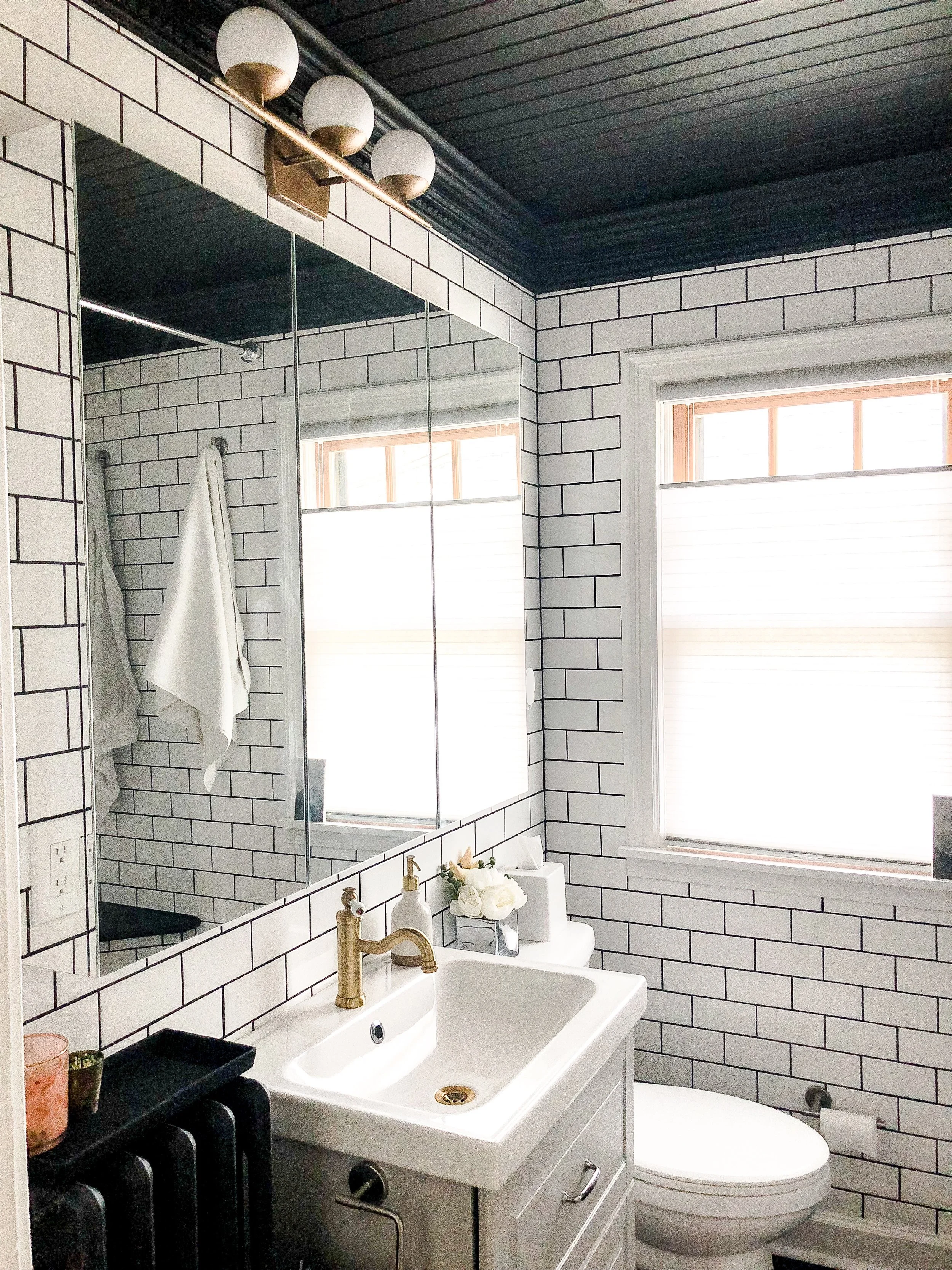 bathroom with black beadboard ceiling.JPEG