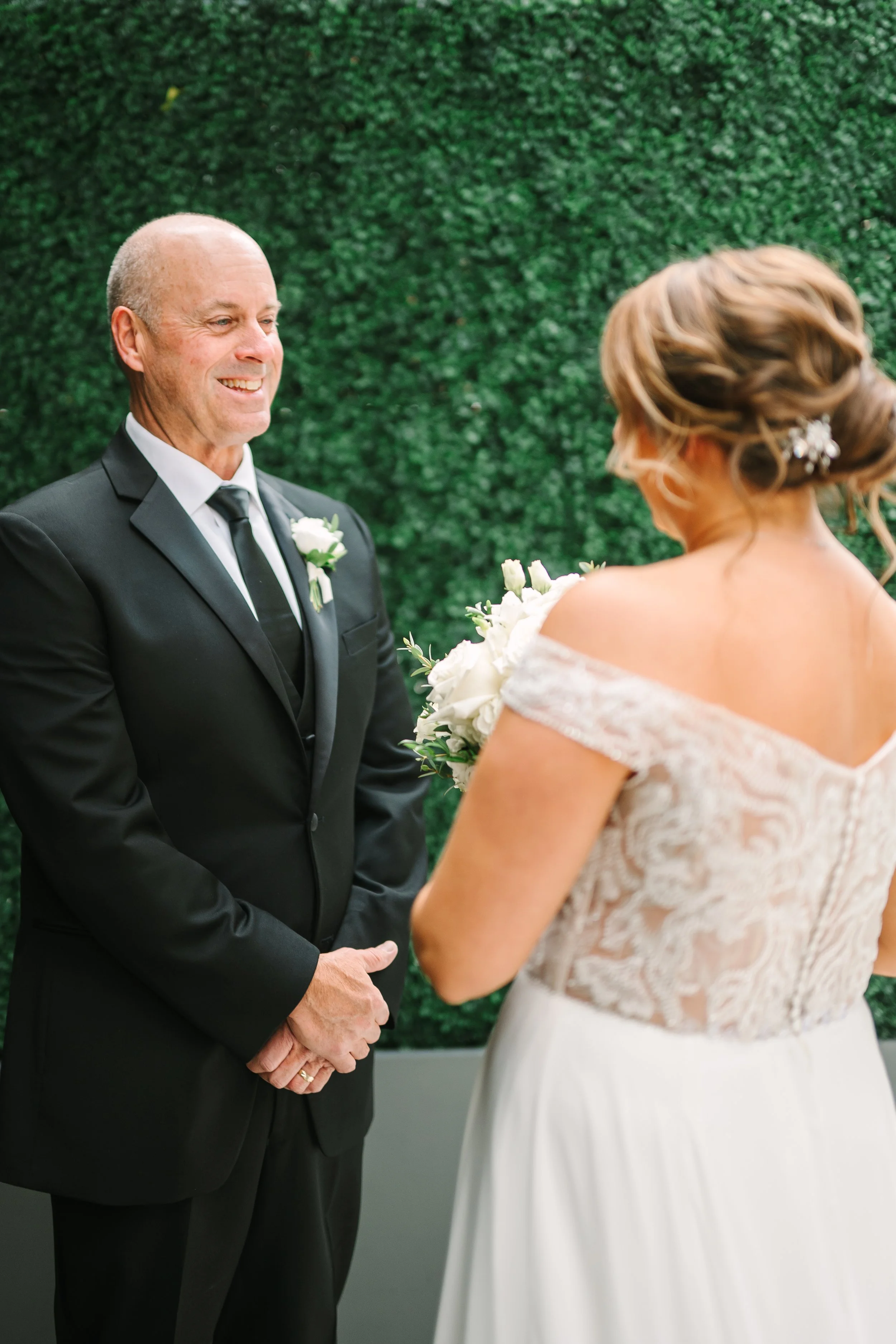 A bride's first look with her dad, on the rooftop of Hotel Monaco in downtown Pittsburgh. 