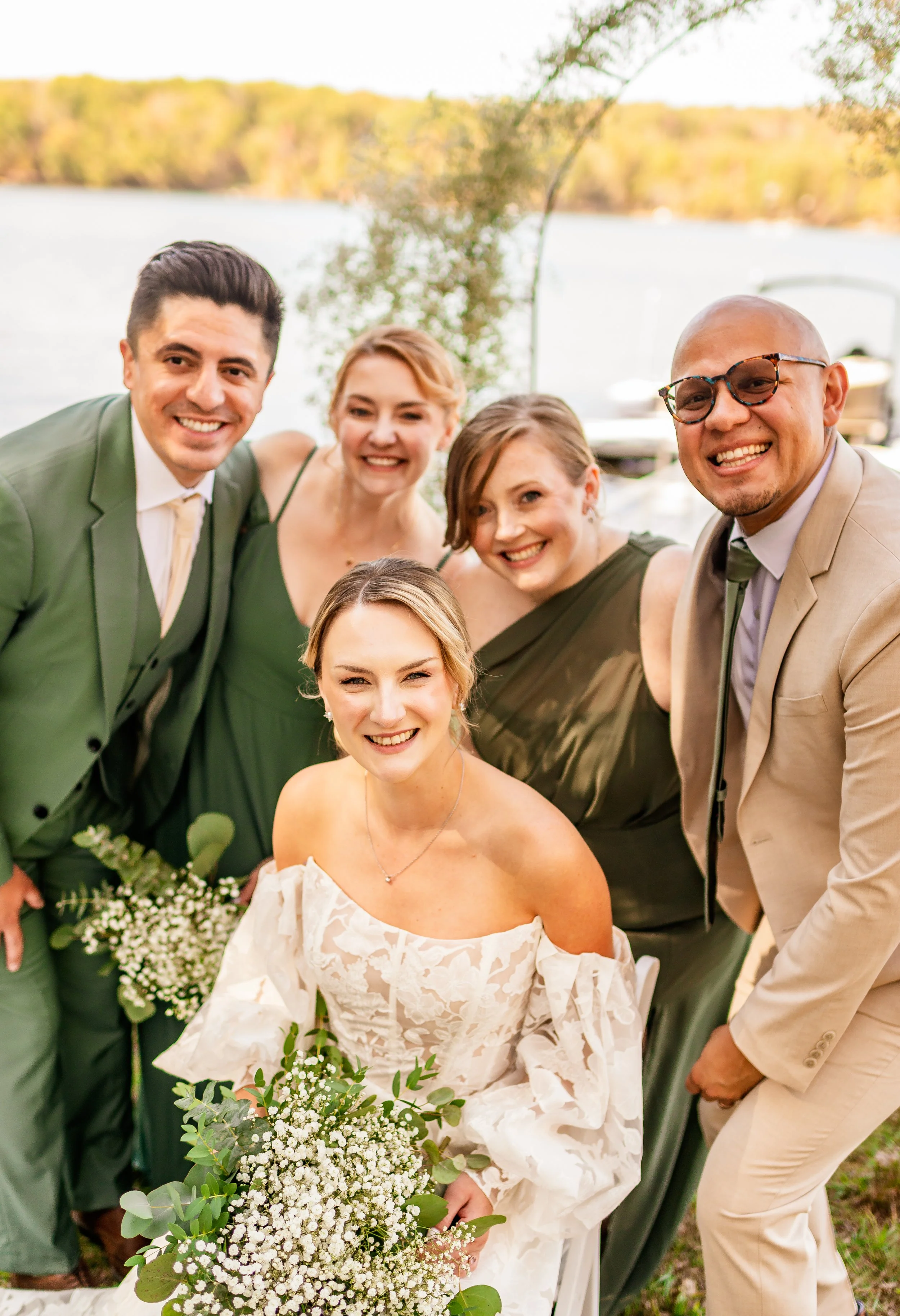 dark green wedding featuring bride, bridesmaids, and brides men on deep creek lake in Maryland at lake house wedding