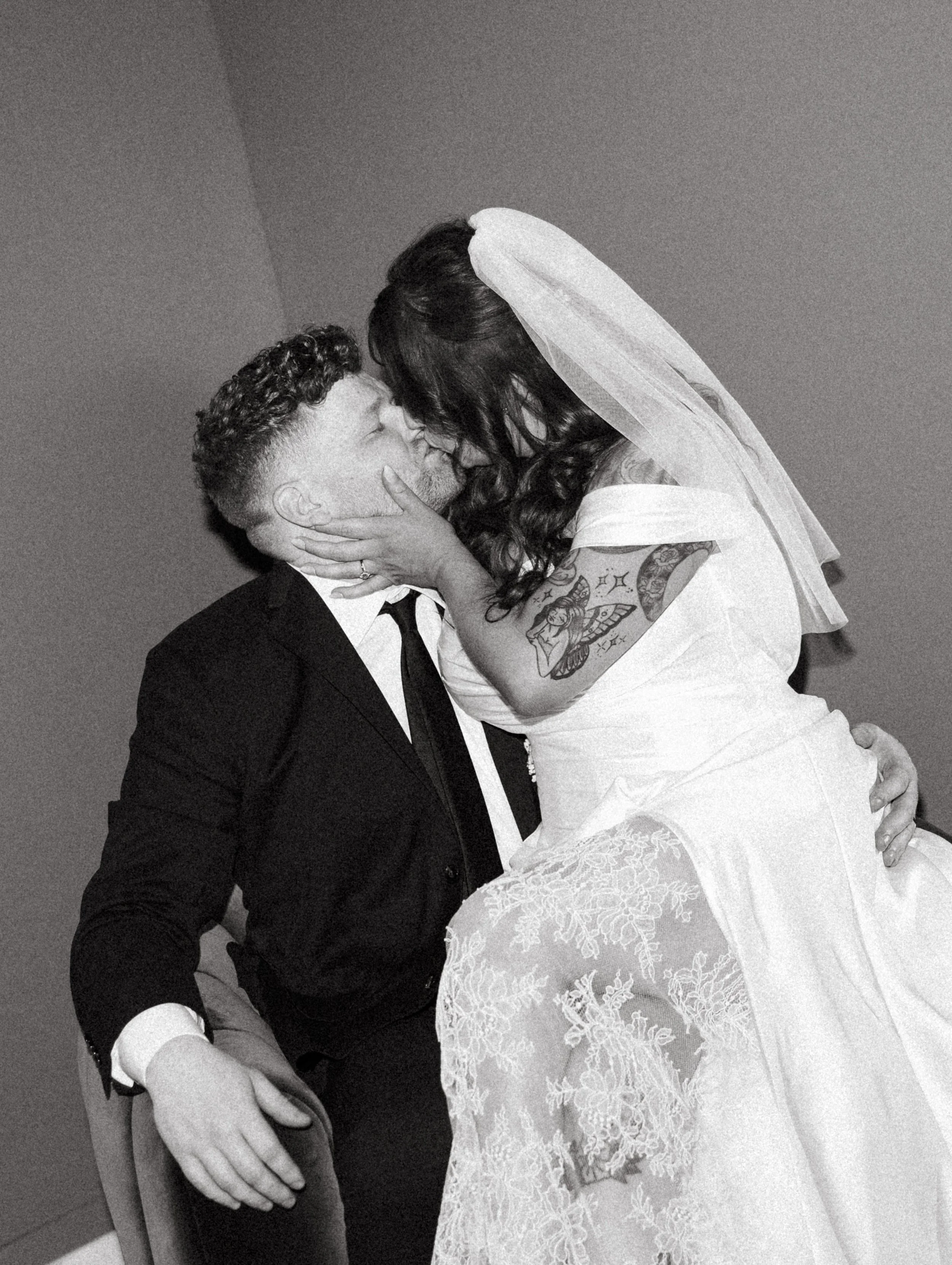 bride and groom kiss