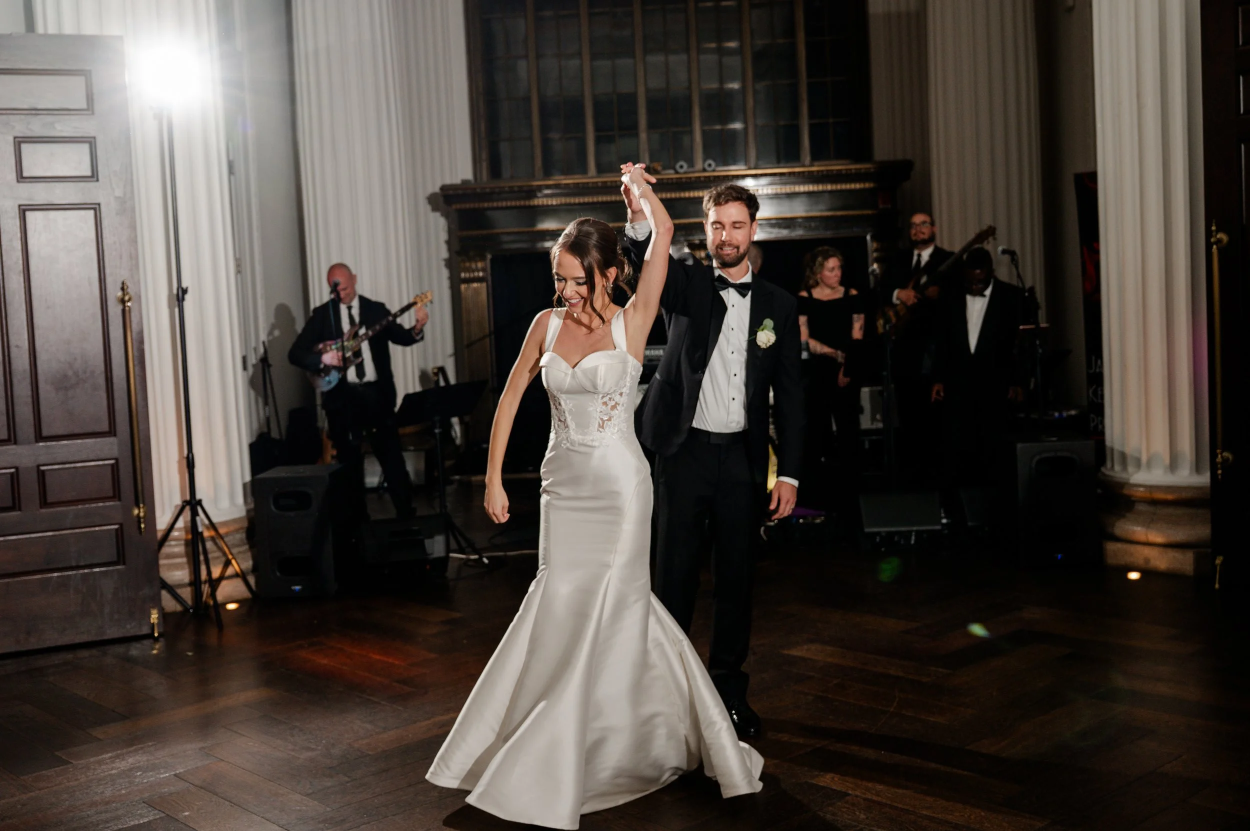 The happy couple, twirllng on the Hotel Monaco dance floor, in front of their live band.
