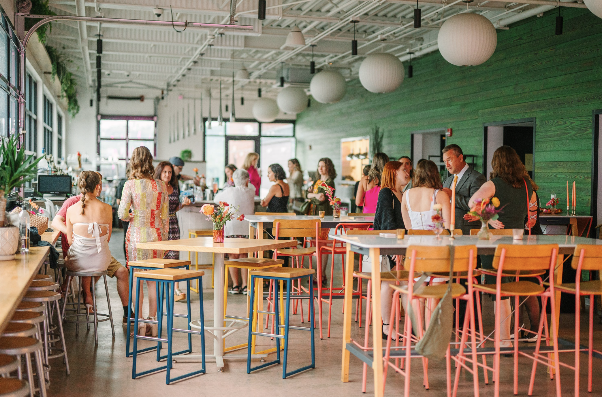 Image of the Over Eden reception room, with example of colorful seating and decor for the Lush Event Co. styled shoot.