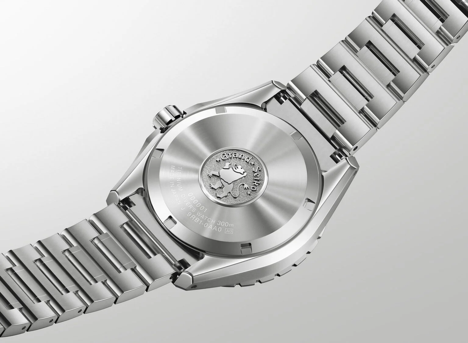 Grand-Seiko-Evolution-9-Collection-Spring-Drive-U.F.A.-Ushio-300-Diver-Ushio-Blue-SLGB023-and-Ushio-Green-SLGB025-caseback-1536x1127.jpg