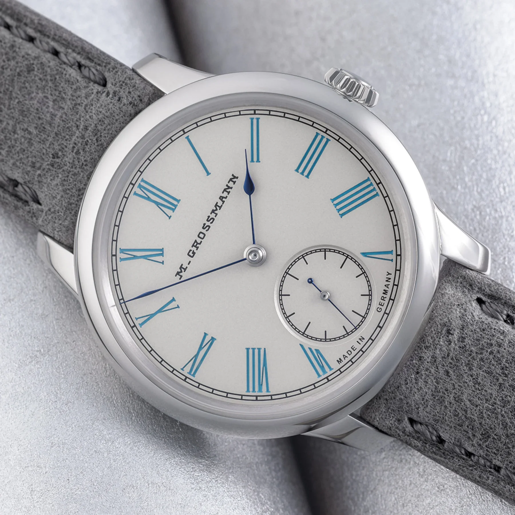 Moritz-Grossmann-Tefnut-36mm-Silver-Plated-by-Friction-Turquoise-Blue-1.webp
