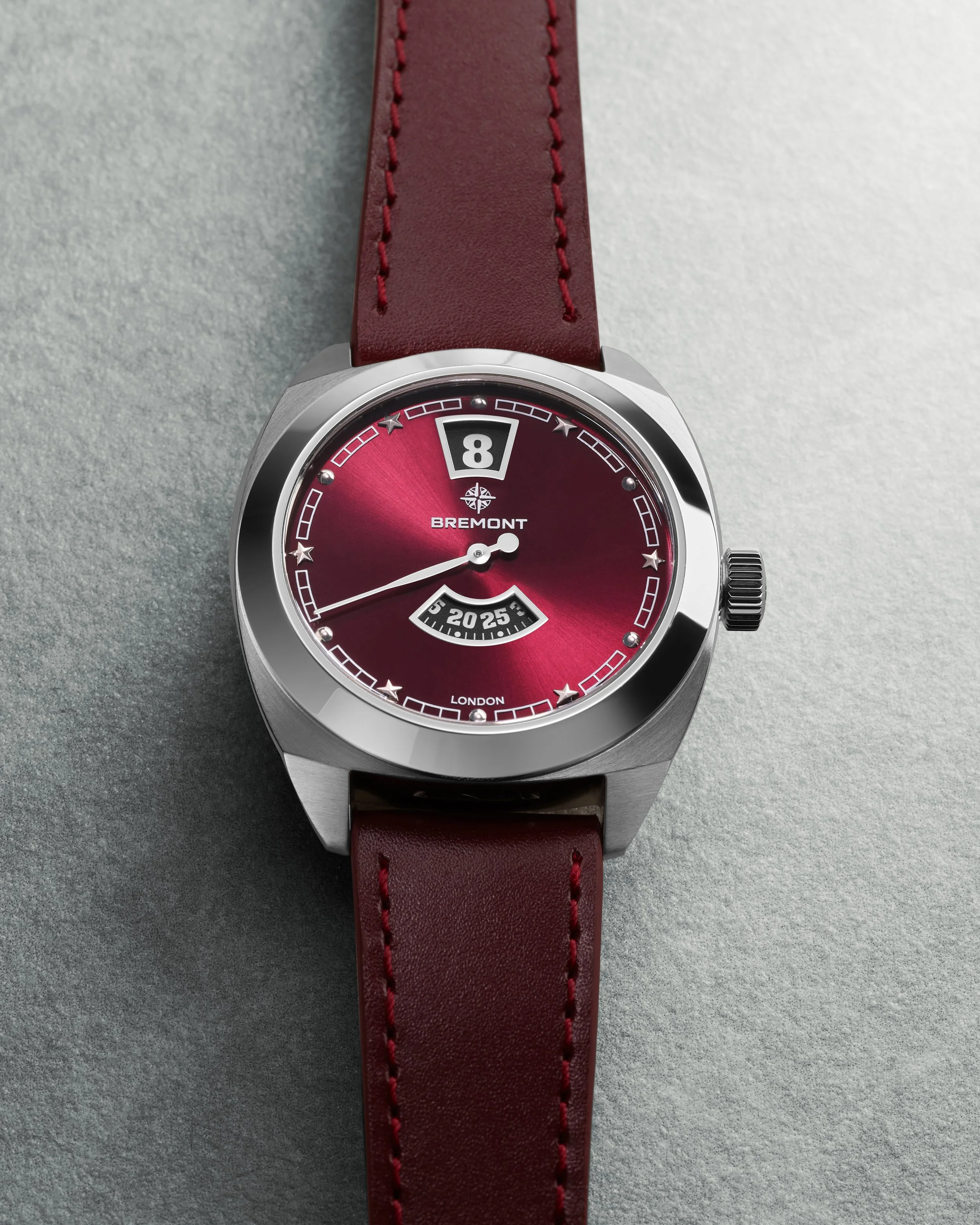 Bremont_TerraNova_JumpingHour35_Burgundy_Laying_L.jpg