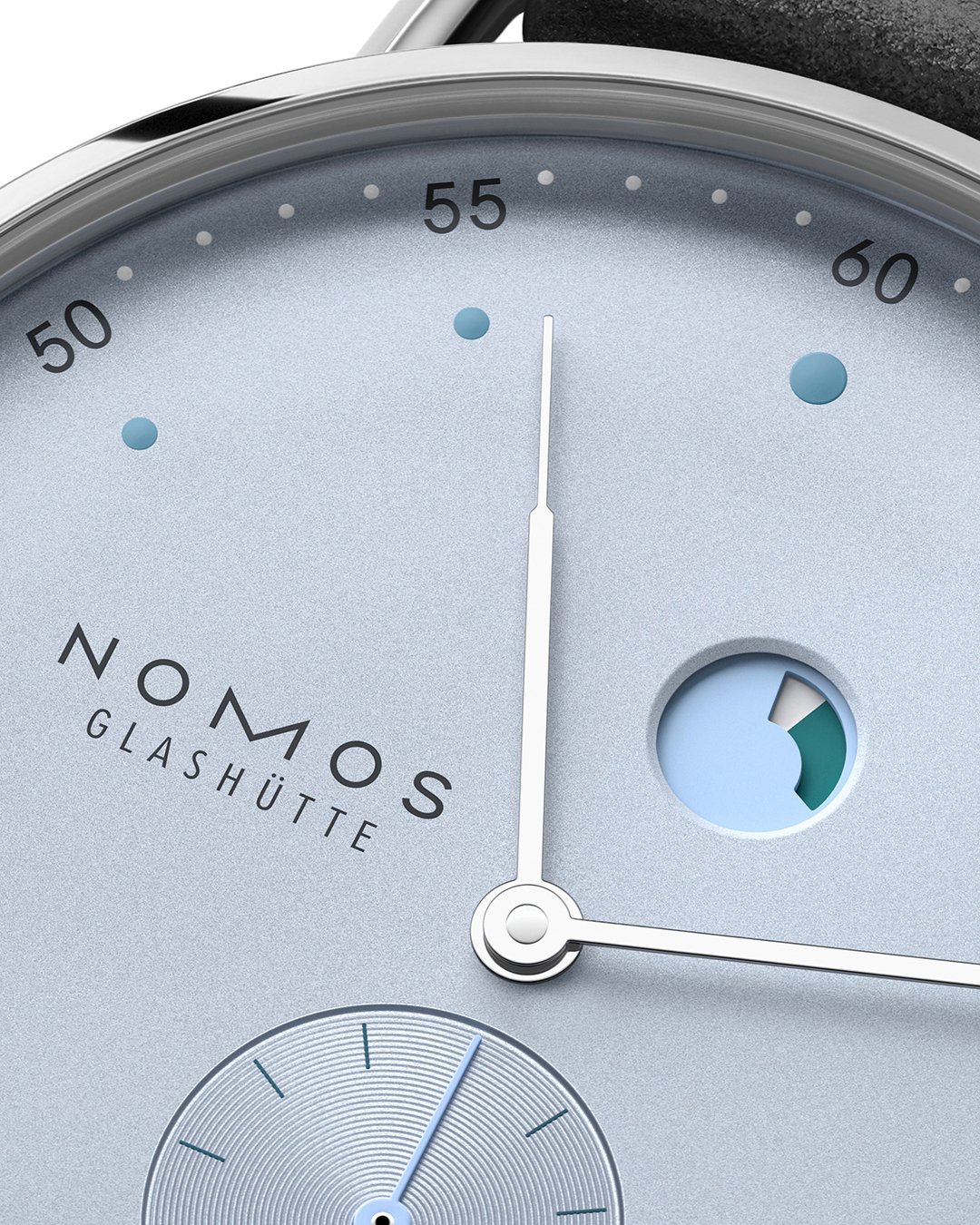 10_NOMOS_1121_1121_SB_Metro_date_power_reserve_ice_blue_1080x1350.jpg