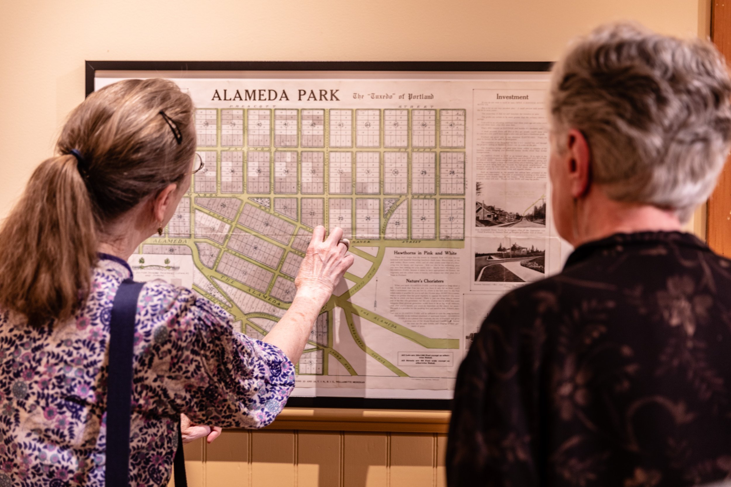 A tour group enjoying the exhibit and walking tour at the Architectural Heritage Center