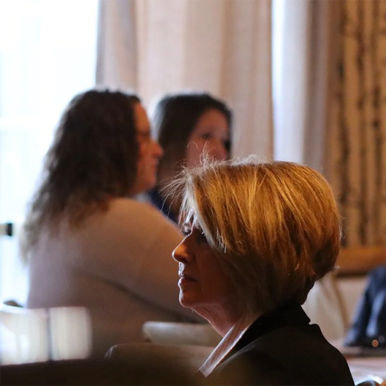 Women attending a WELL Women Educators Leading Learning educational conference