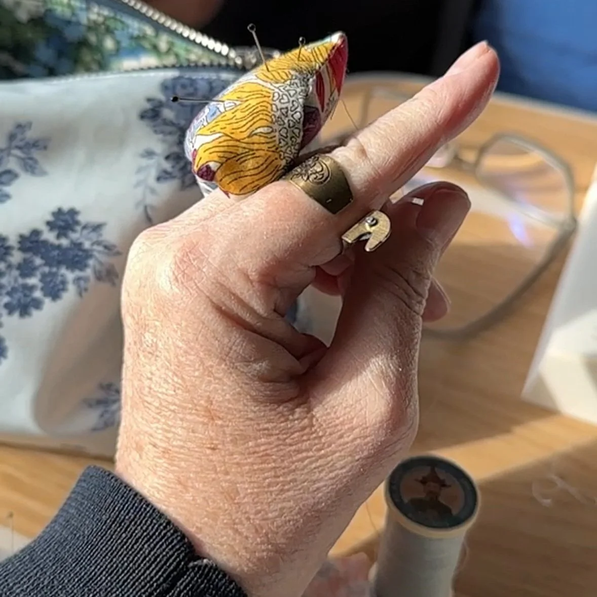 Mel Storey Patchwork_Clover thread cutting ring.jpg