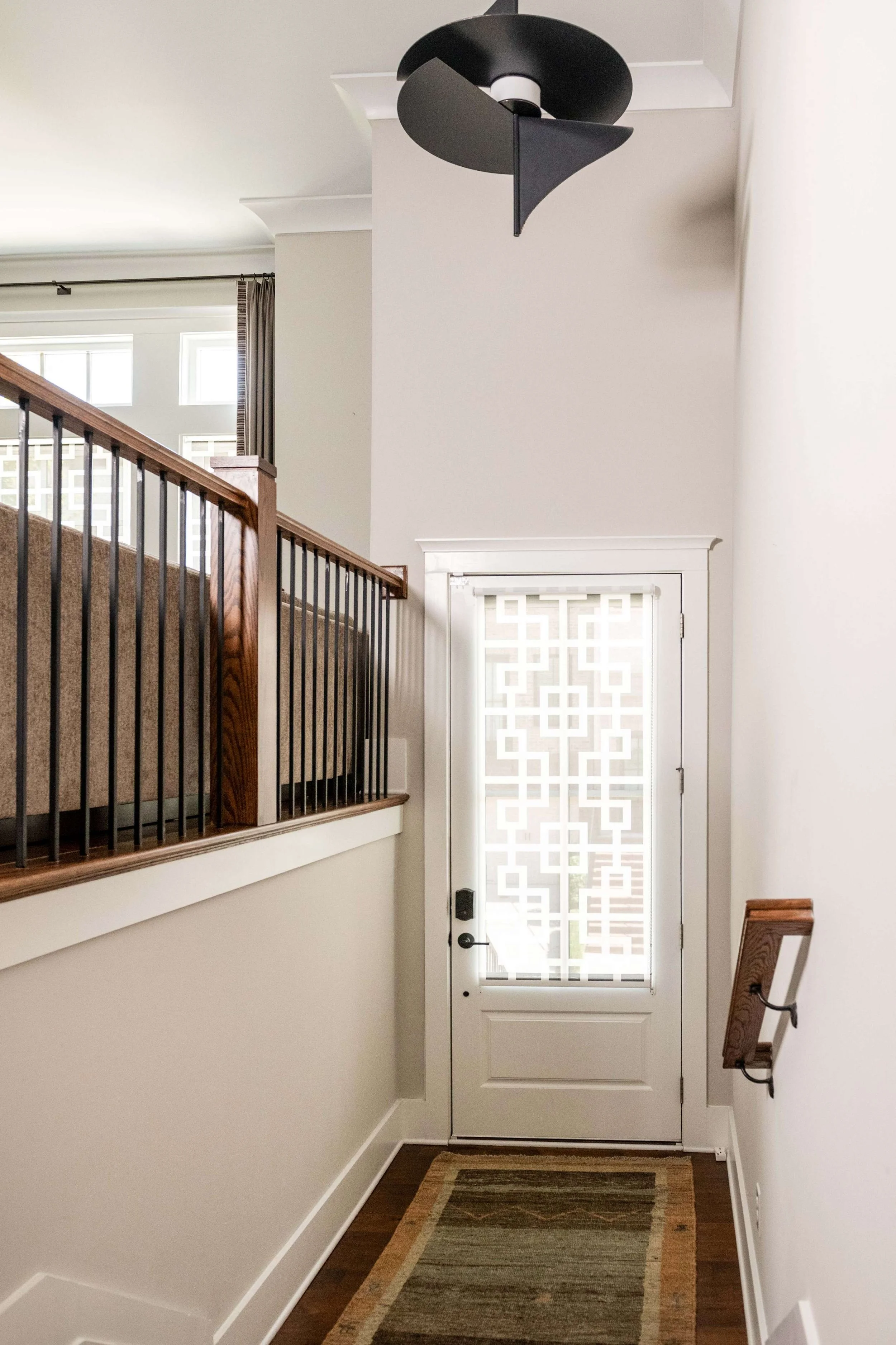 minhnuyet-hardy-dunwoody-row-house-staircase-and-entry.jpg