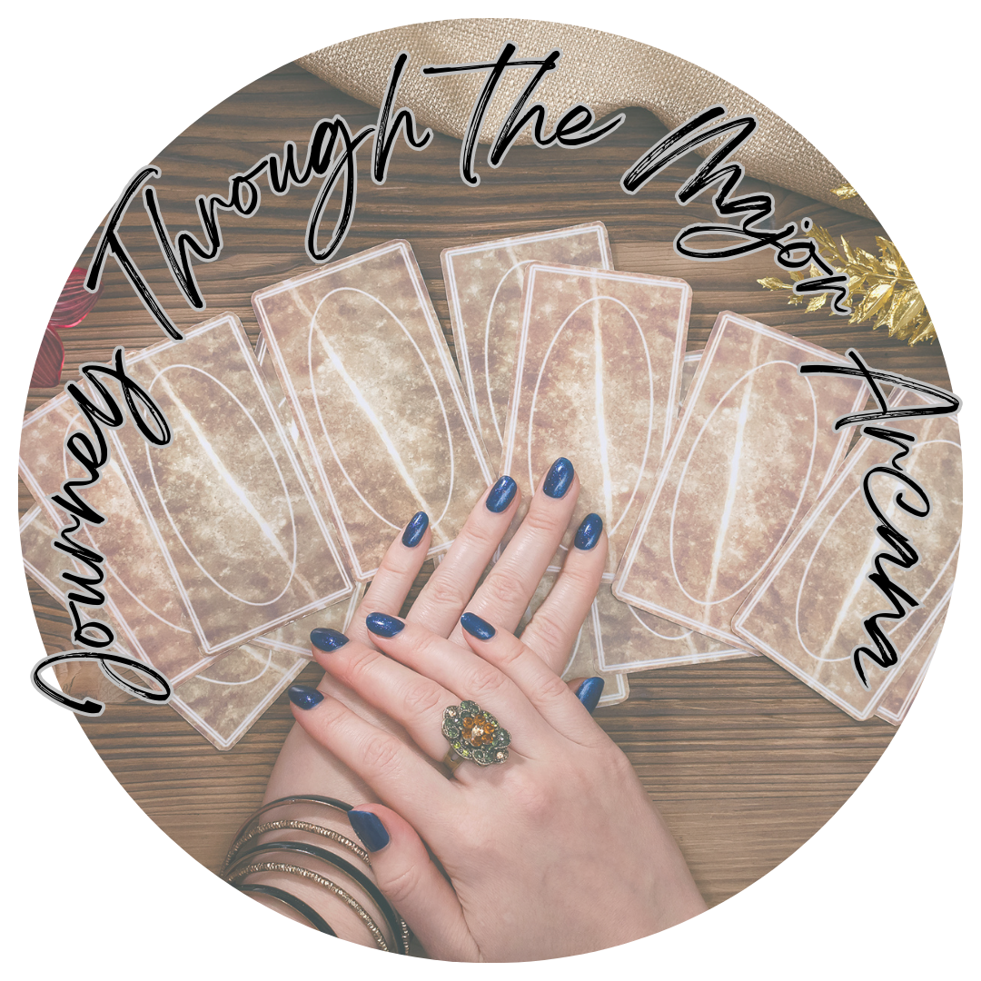 A person's hands with blue nail polish, jewelry, and a large ring, resting on a wooden table with tarot cards and decorative items, overlaid with the phrase 'Journey Through the Moon' in black cursive.