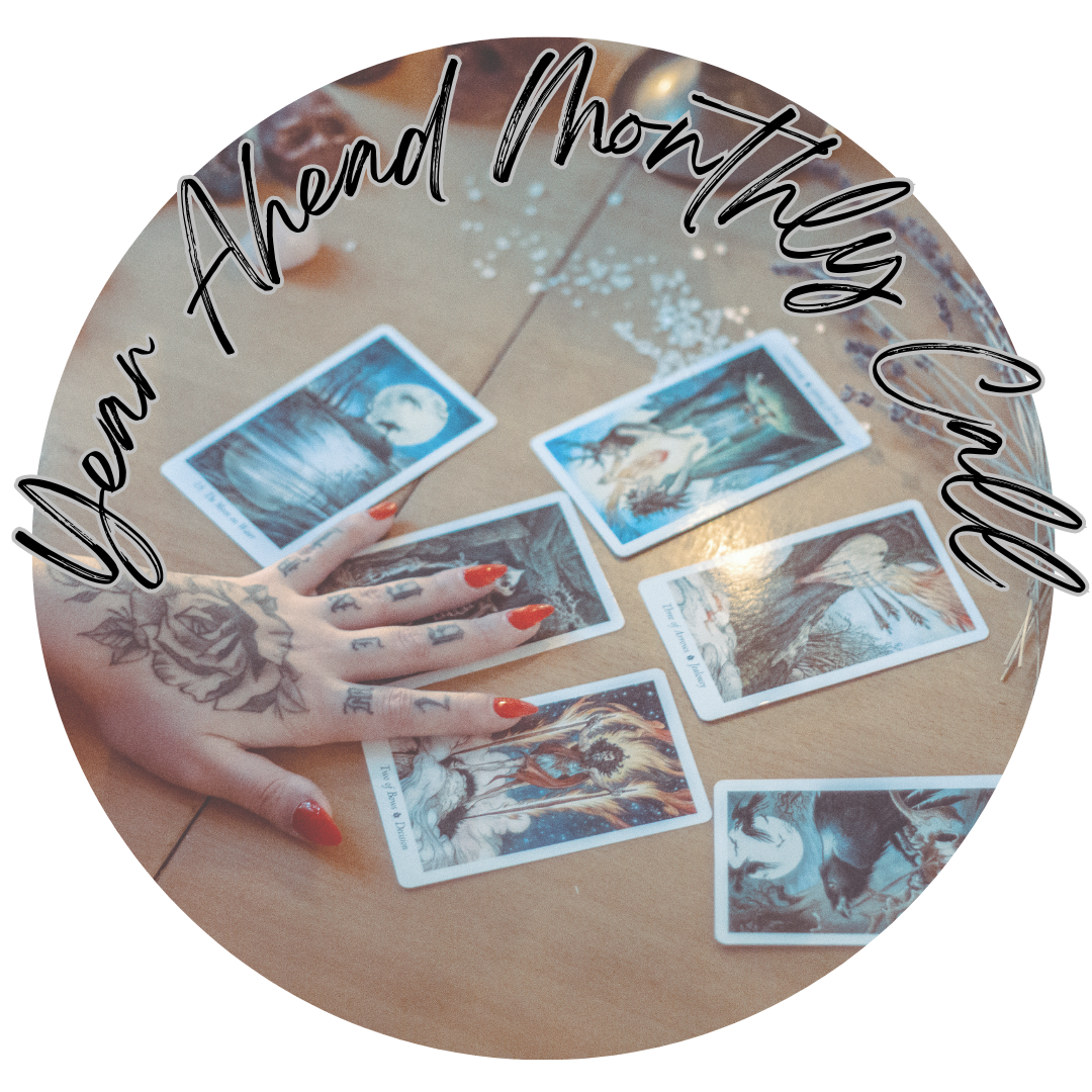 A tarot card reading spread on a wooden table with a woman's hand showcasing red painted nails and tattoos, surrounded by seven tarot cards and white stones. The phrase 'Learn and Mothing' is written in black cursive over the image.