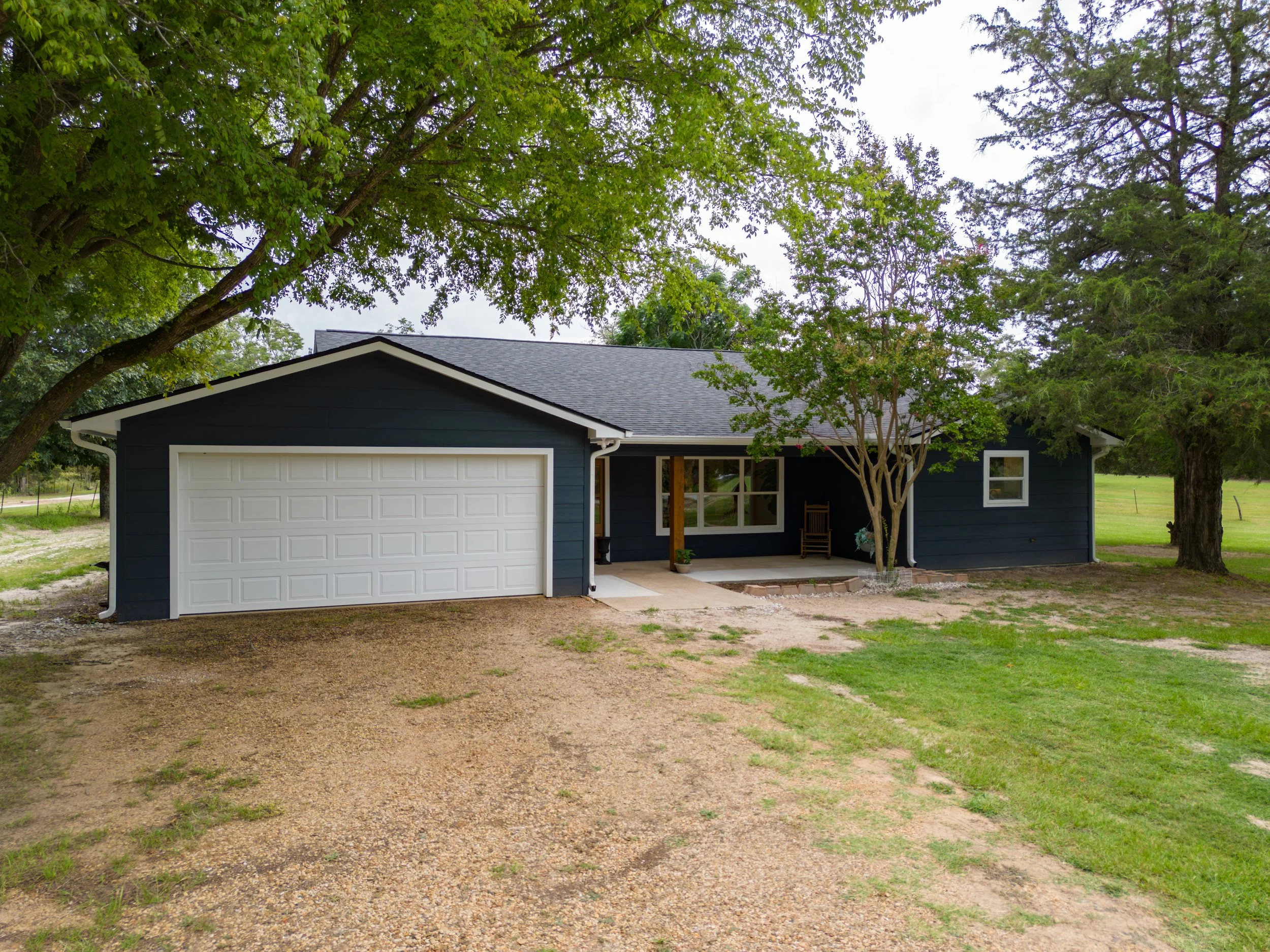 [Front exterior view, from driveway.]