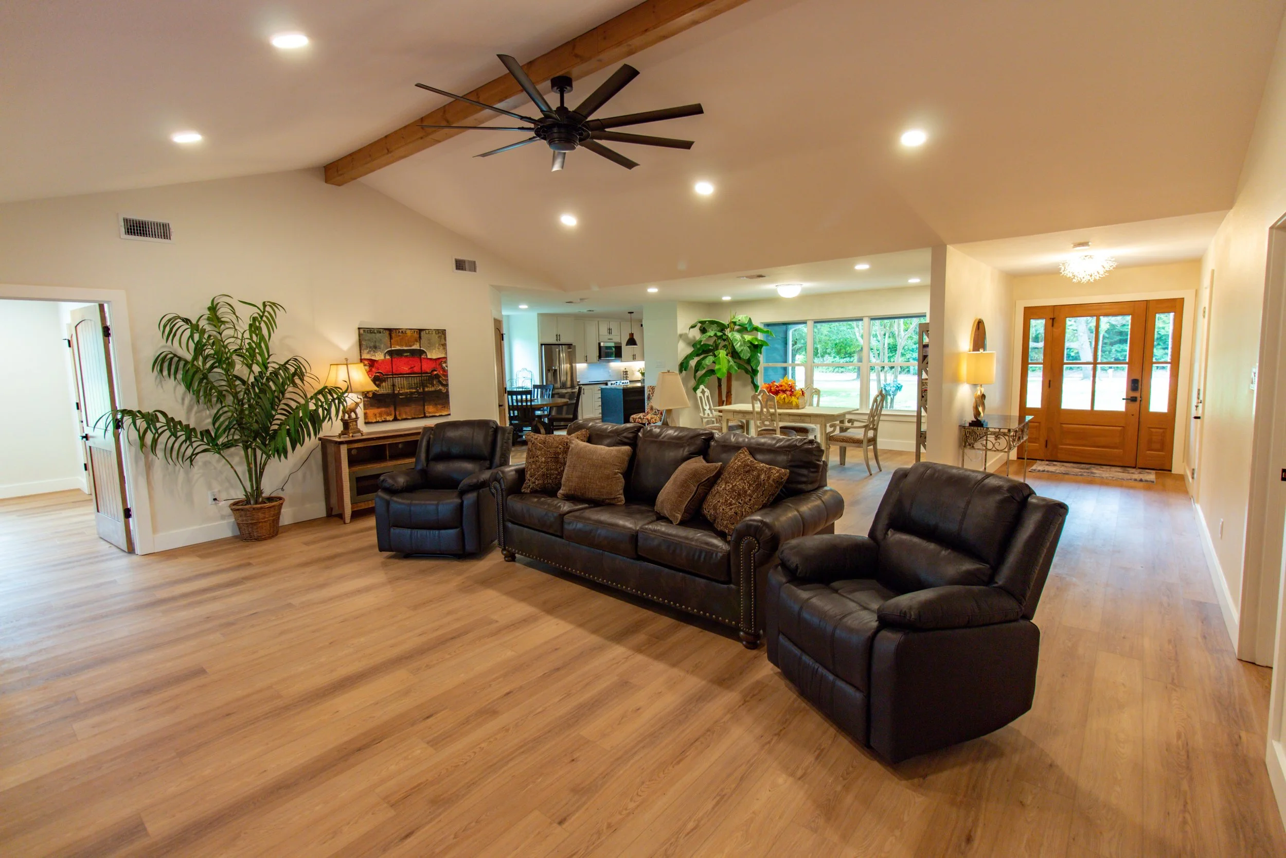 [Living room.]

Lounge on the three-person leather couch or have a seat in one of our two leather recliners.