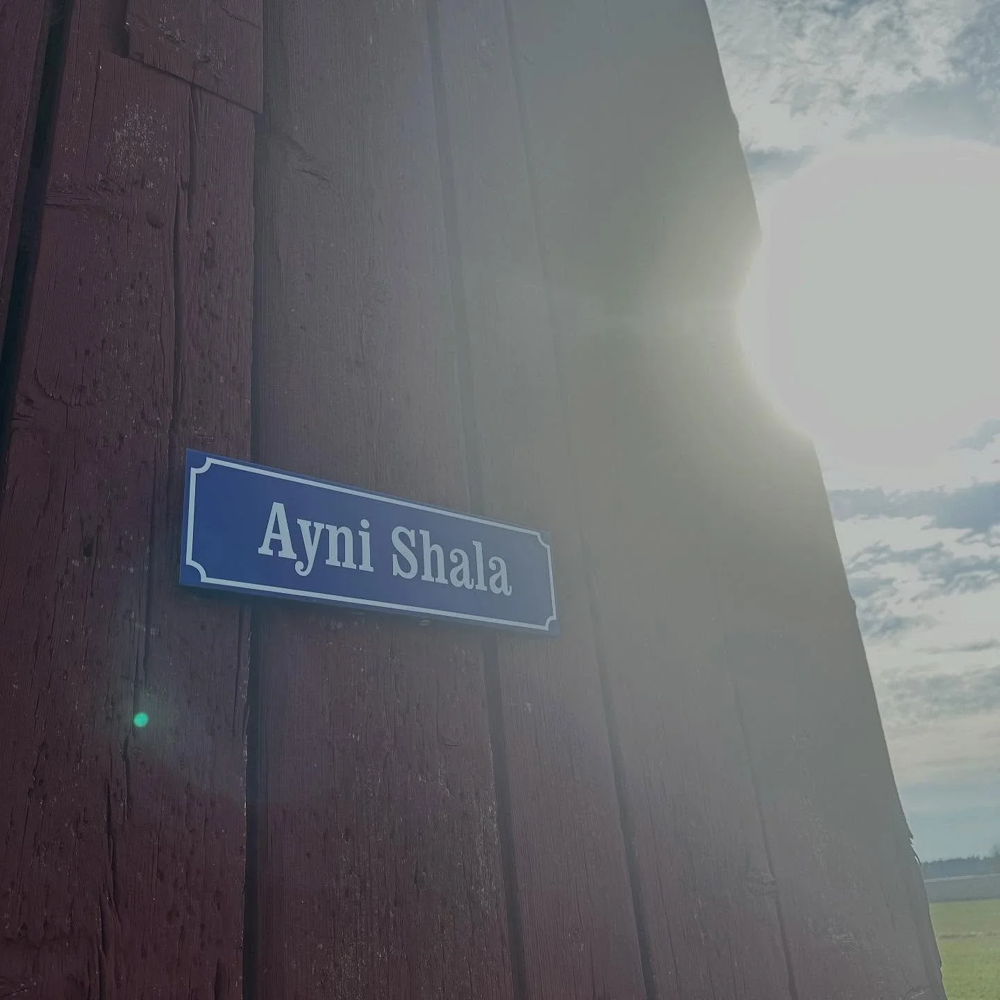 Ayni Shala skylt.jpg