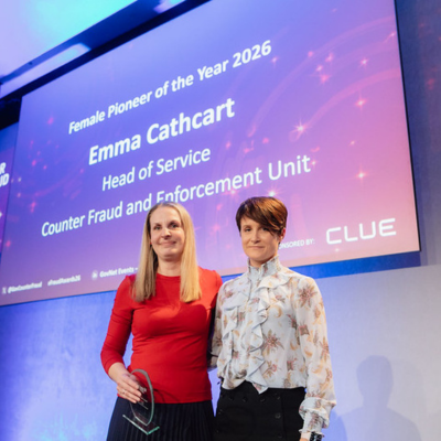 Photo - winner receiving a trophy at the Public Counter Fraud Awards