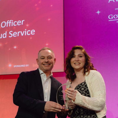 Photo - winner receiving a trophy at the Public Counter Fraud Awards