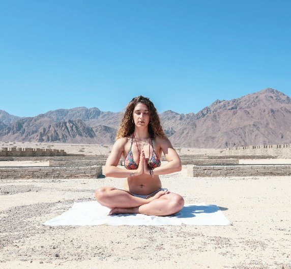 Woman breathing in the desert
