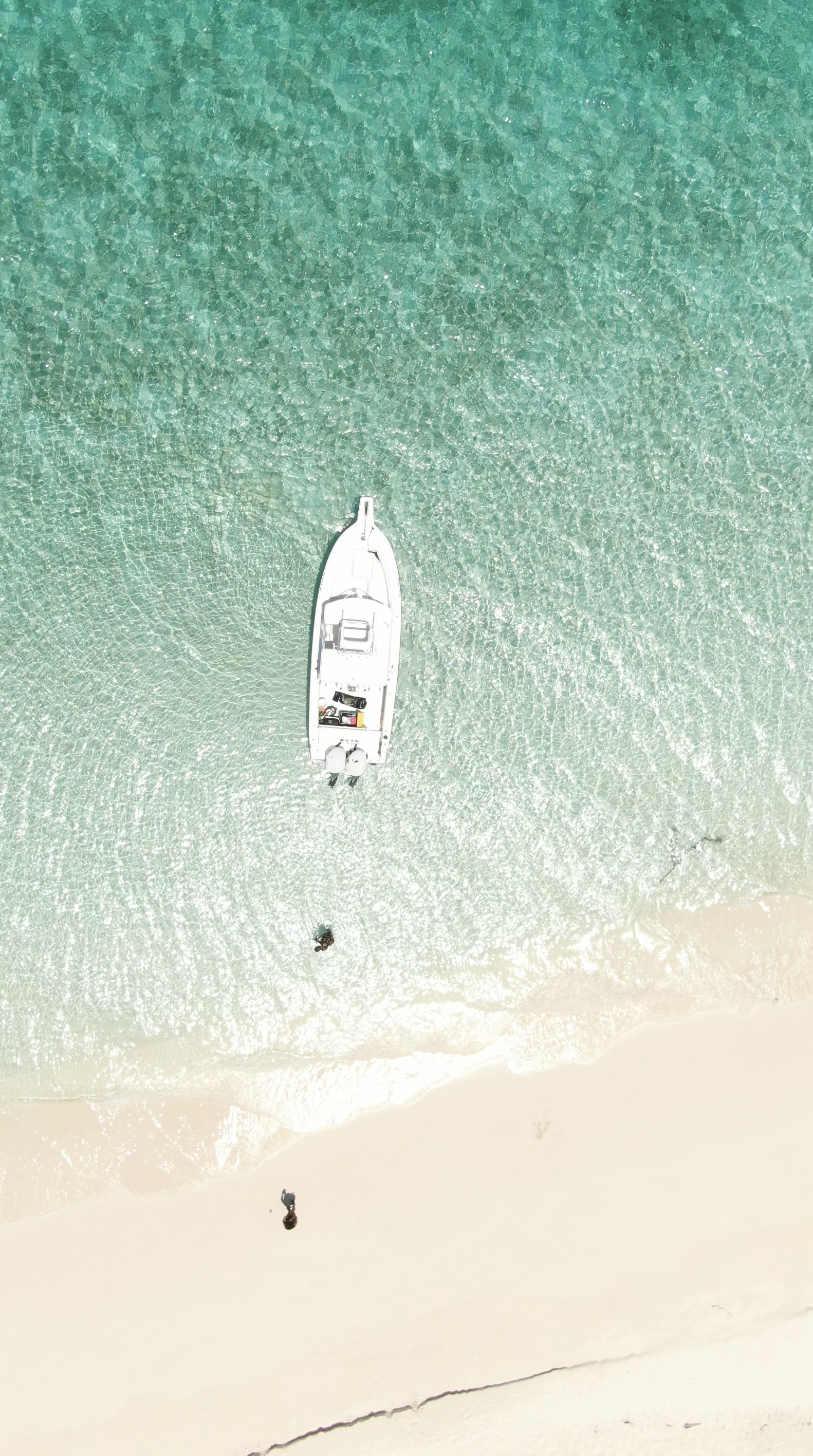 Overhead Image of 30' Center Console Powerboat in vibrant turquoise waters in The Bahamas - My Bahamas Boat Tours