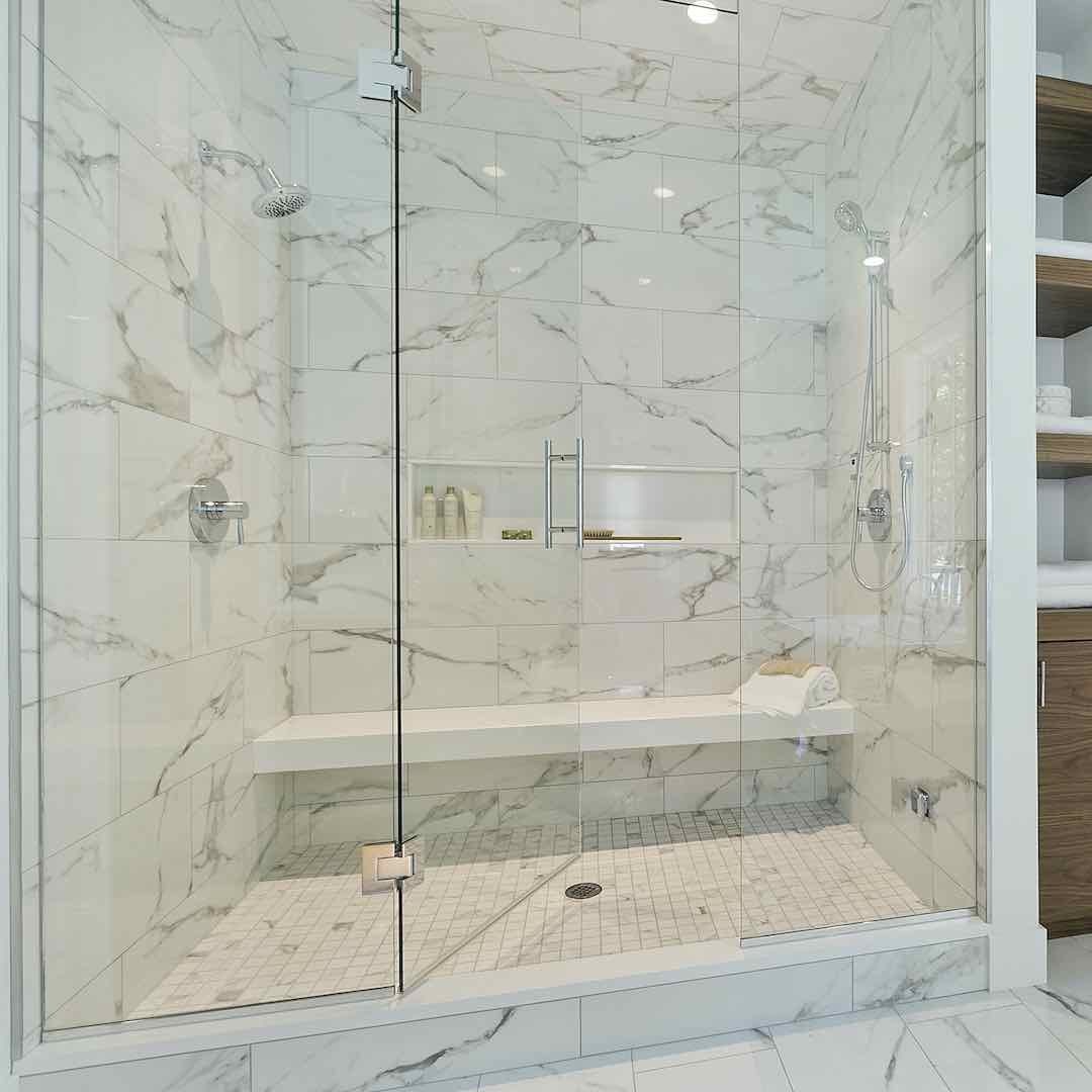 https://images.squarespace-cdn.com/content/v1/64a839dc19fa54458794ae1f/1691181484741-IJ4333GQKXZKBJBVPF2O/Marble+Walk-In+Shower+with+Bench+Seat.jpg