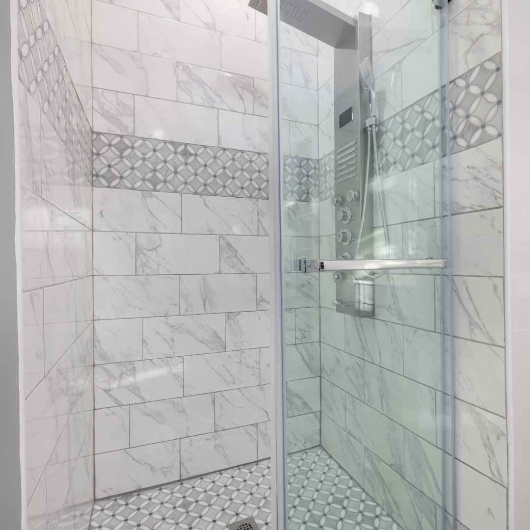 https://images.squarespace-cdn.com/content/v1/64a839dc19fa54458794ae1f/3d623179-1281-4b29-9e94-87f07c4cb0a3/Tiled+Walk-In+Shower+for+Small+Bathroom+Space.jpg