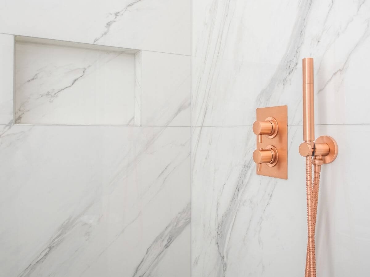 Marble Shower with Polished Brass Fixtures