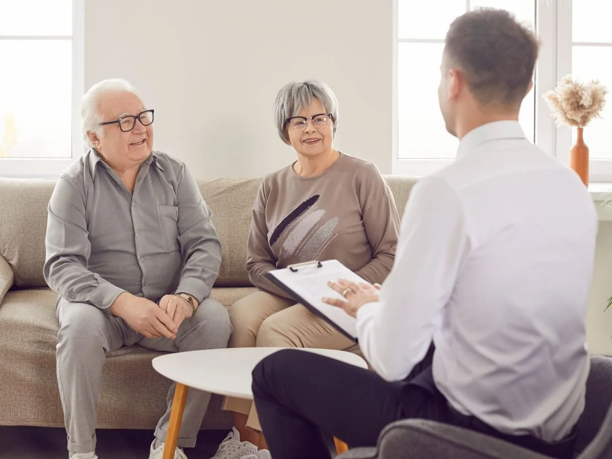 Two Seniors Meeting with Bathroom Accessibility Consultant