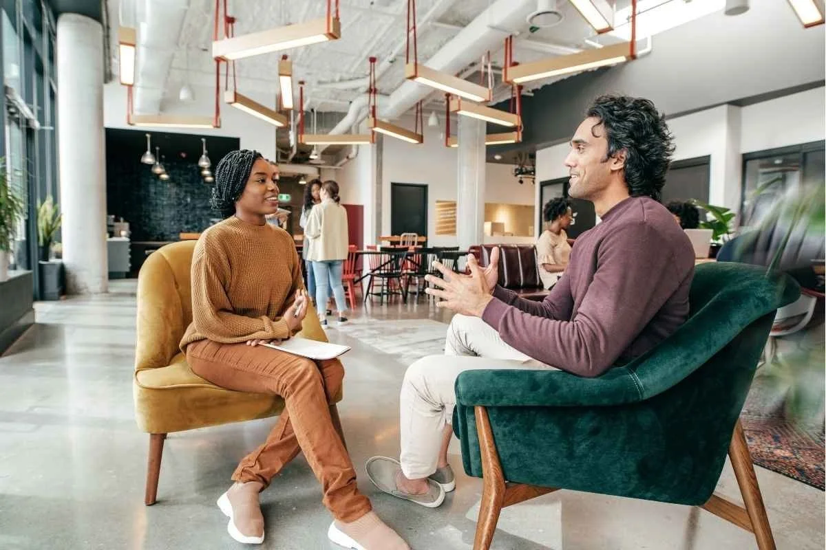 A group of professionals engaging in effective communication techniques.