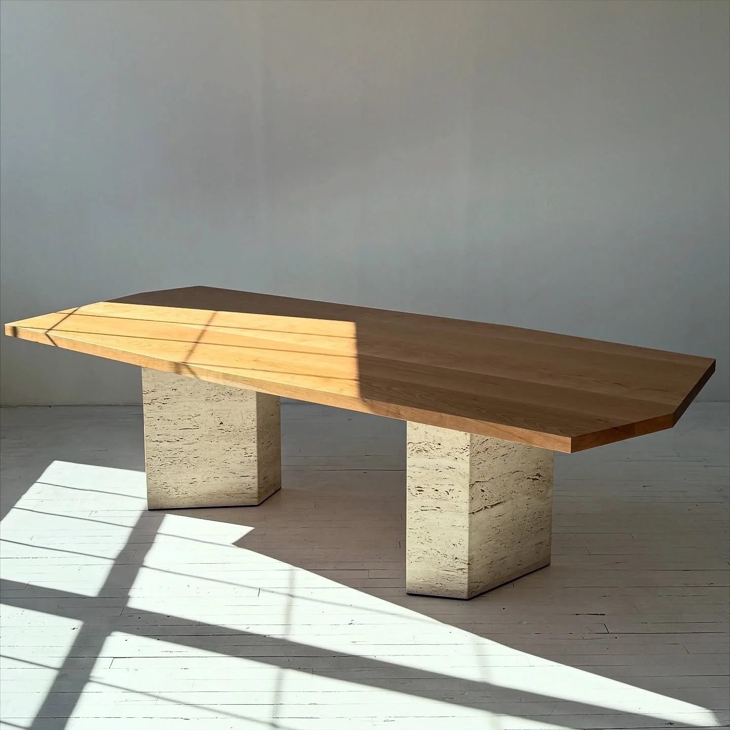 We have been working on this new design for a while and are very excited to finally have it in our showroom. Shown in solid cherry wood with travertine legs. Better photos to come but we couldn’t wait to share this one. We have a few new design
