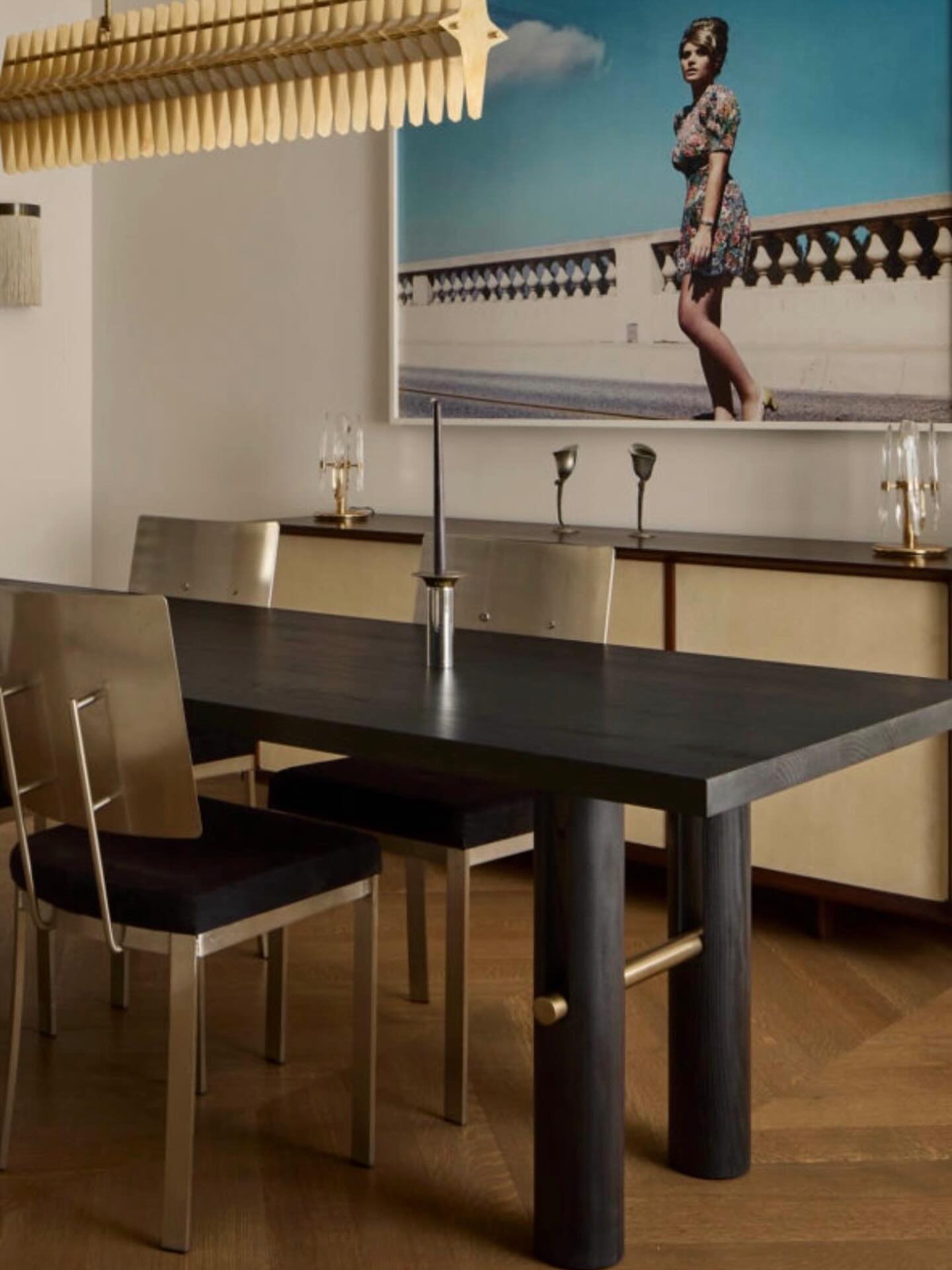 Photo credit and design by @fredericktangarchitecture . Our LOUP table in ebonized finish.