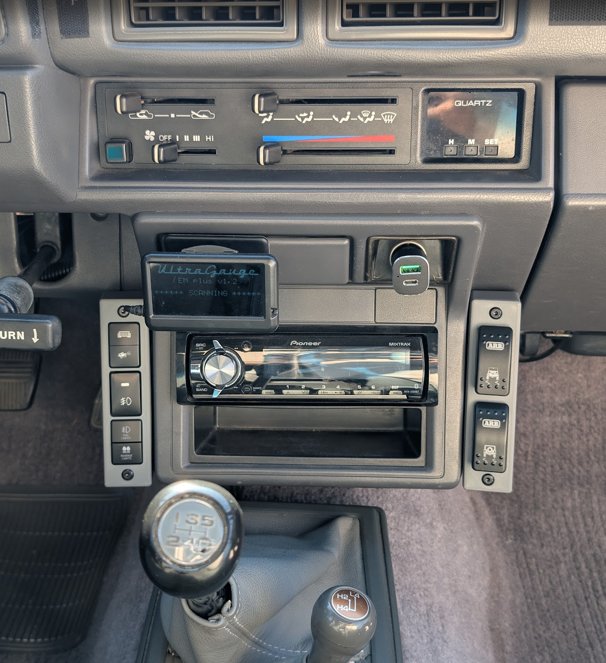 AuxPanel System installed in 1st gen Toyota 4Runner Pickup, driver & passenger  side, gray