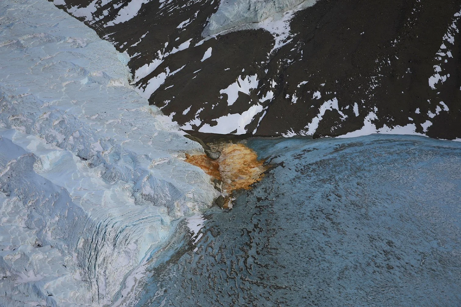 Aerial of Blood Falls (red from iron oxide) in Taylor Valley, one of the Dry Valleys in Antarctica.
