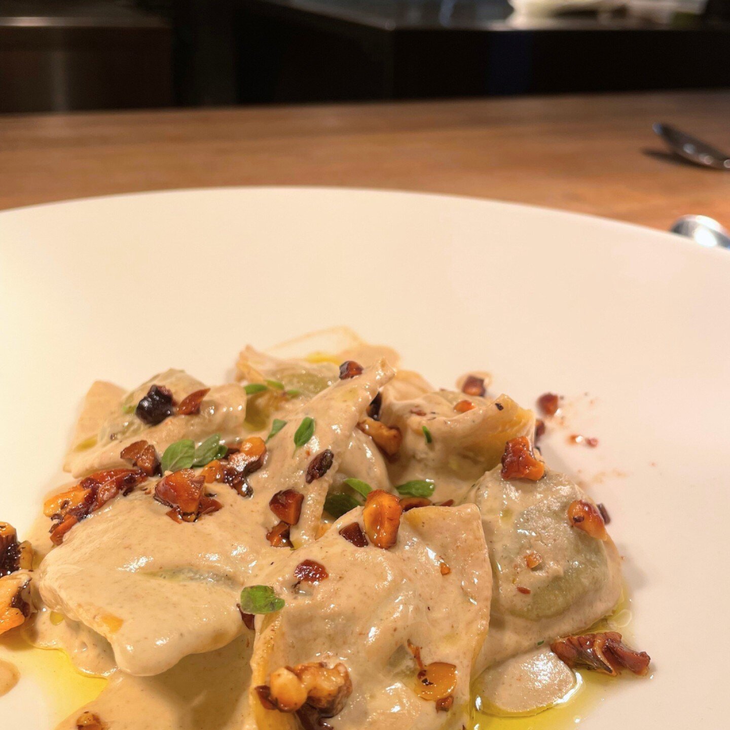 We love to make our veggies decadent...
.
The Ligurian Ravioli, the newest addition to the menu and our vegetarian option! 
.
Braised greens and parmigiana Reggiano stuffed raviolis with a creamy walnut pesto finished with fresh marjoram. 
.
Our chan