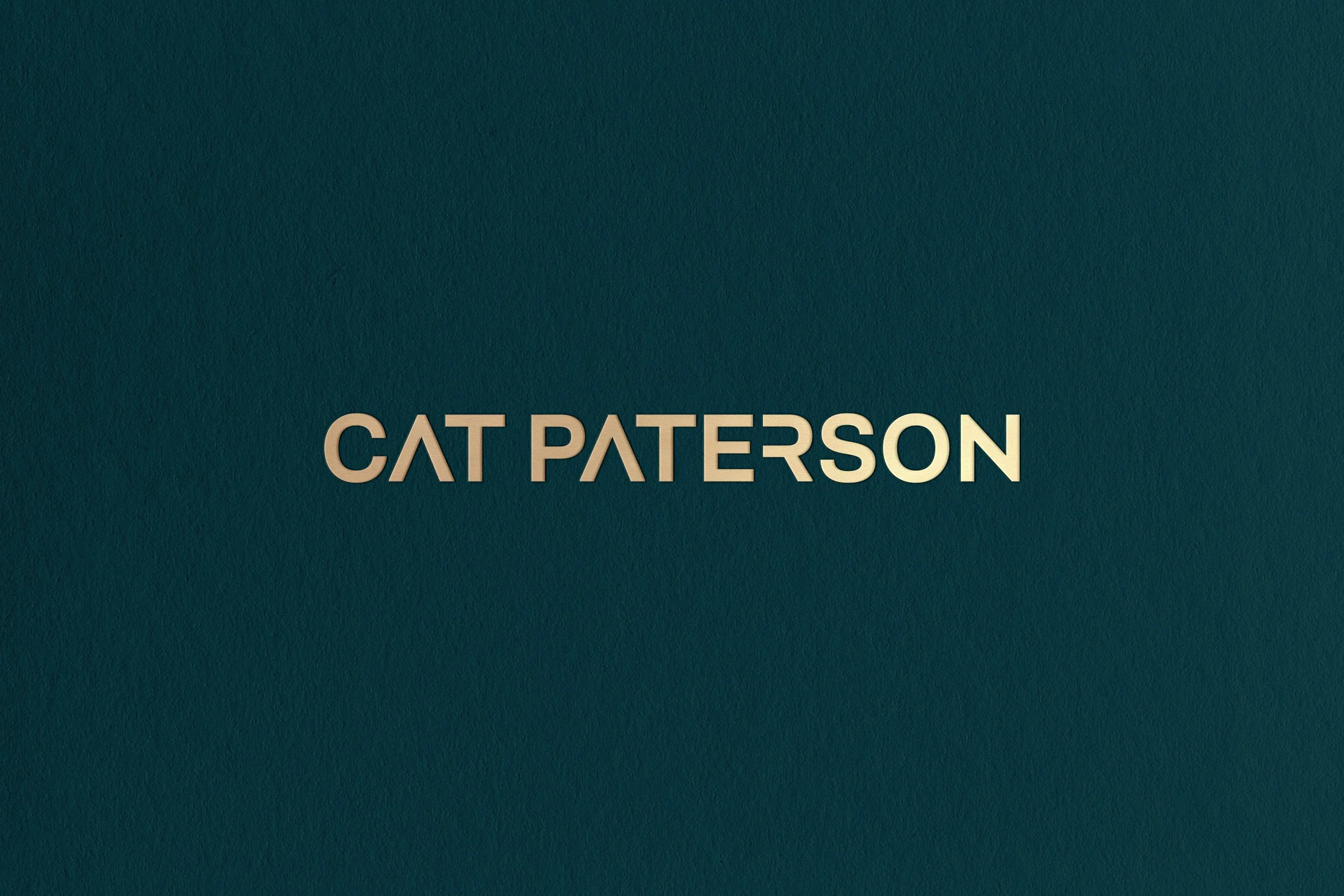 cat paterson logo gold.jpg