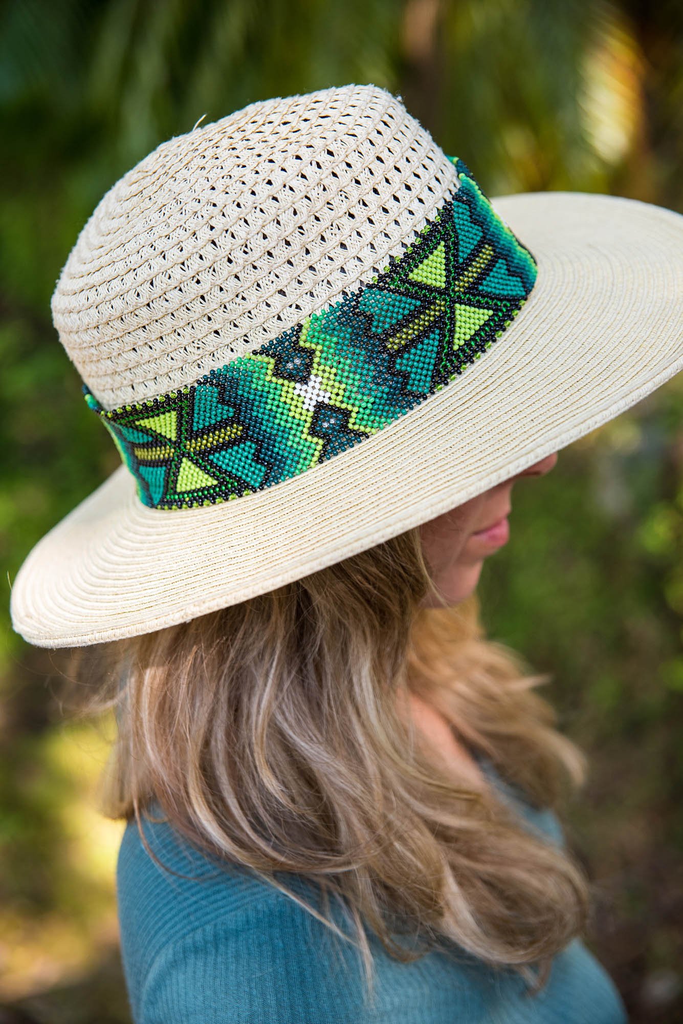 product photo of hat with green beaded band taken by Sharma Shari Photography